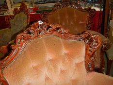 A pair of carved mahogany framed arm chairs. Collect only.