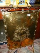 A heavy old brass fire screen. Collect only.