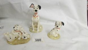 Three Royal Doulton 101 Dalmations figures.