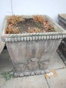A very large square planter with rope and leaf decoration. 60 cm square x 63 cm tall. collect only.