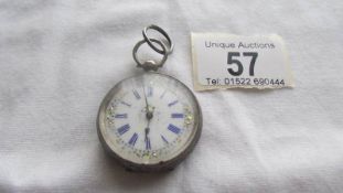 A Victorian ladies silver fob watch (needs attention).