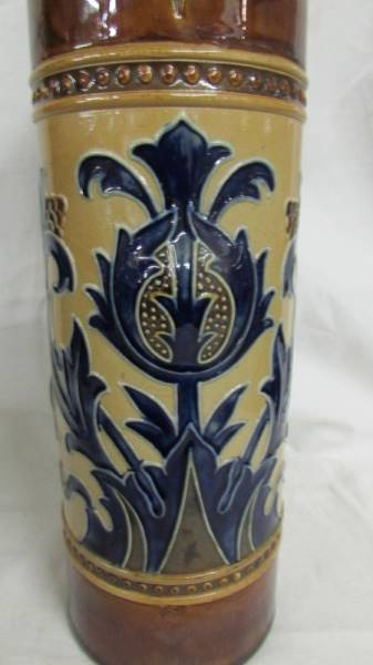 A 10.5" tall jug by Royal Doulton. Cream ground for main body and brown for the top and bottom. - Image 3 of 4