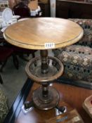 A victorian mahogany tea/wine table on centre column with spindled shelf Height 71cm x 42cm