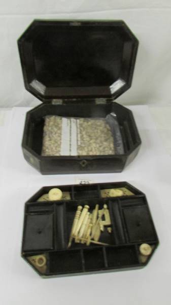 A Chinese lacquered work box with bone tools, needle holder, thread holder and bag of seashells - Image 3 of 3