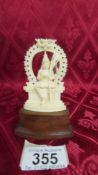 An antique carved ivory figure of an Indian Diety. Available for UK shipping only.