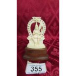 An antique carved ivory figure of an Indian Diety. Available for UK shipping only.