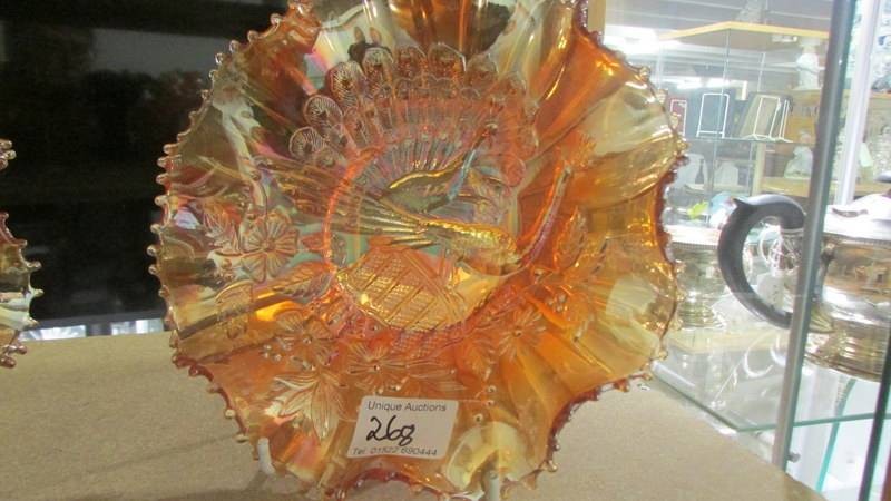 Two Carnival glass marigold peacock on fence bowls. - Image 3 of 4