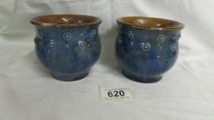 A pair of small Royal Doulton pots, 9cm tall.