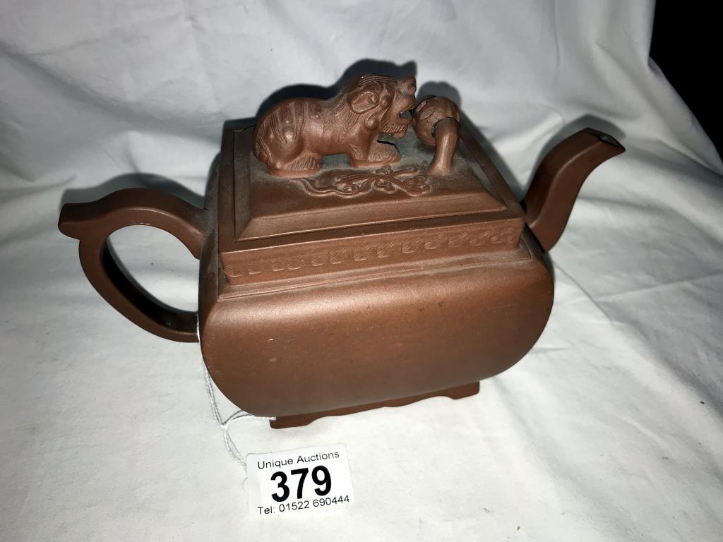 A Chinese earthenware teapot with dog of foo knob to lid. A/F - Image 11 of 12