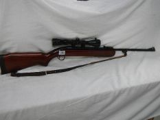 A BSA Airsporter 0.177 cal. U/L beech stock, silver antler scope (Tasco) and case. COLLECT ONLY