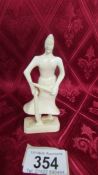 An antique carved ivory warrior figure. Available for UK shipping only.