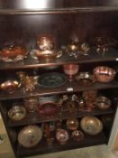 A large collection of Carnival glass bowls plus jugs and vases (mostly amber but a few blue or