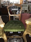 An Edwardian mahogany bedroom chair with green draylon and deep buttoned seat