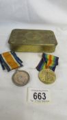 A WW2 Christmas tin with contents and Two WW1 medals for 24780 Pte J Hudson, W. Yorks Reg.
