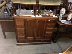 An Edwardian mahogany dresser base with multiple drawers and 2 doors, 104cm x 52cm x 90cm high