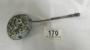 A Russian Faberge' style white metal and cloisonne spoon. Length 18.75cm. Bowl diameter 6cm, depth