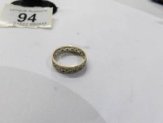 A 9ct gold eternity ring, size J.