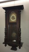 A Victorian mahogany Vienna wall clock Height 102cm