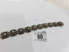 A vintage Italian micro mosaic ten panel bracelet.