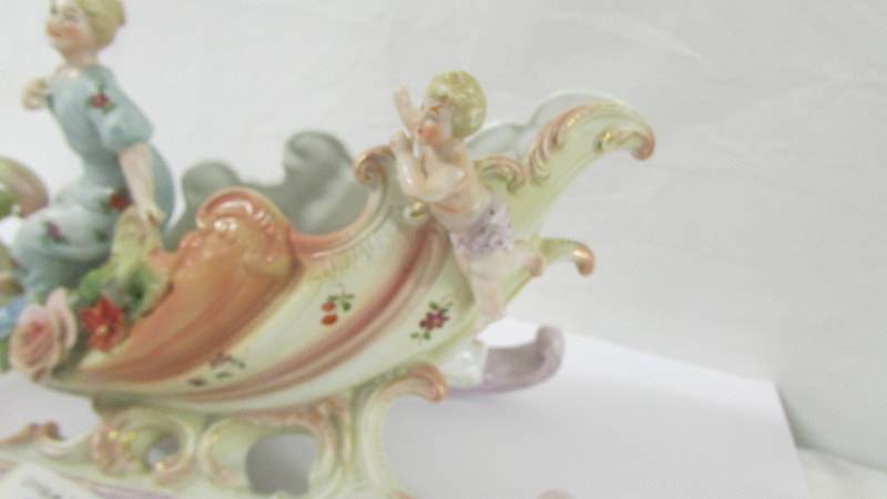 A porcelain swan carriage figure group. - Image 4 of 4