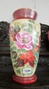 A Victorian hand painted glass vase.