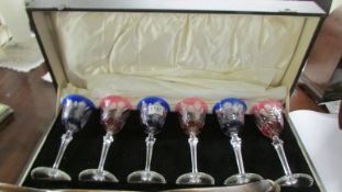 A good cased set of six overlaid wine glasses.