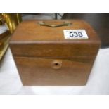 A Victorian mahogany tea caddy.