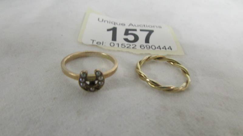 A ring set seed pearls (two missing) an another ring, both size F. (both test as gold).