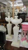 A pair of tall alabaster table lamp bases.