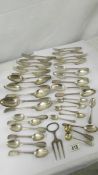 Approximatley 40 pieces of silver flatware, approximately 2200 grams in total. All have English Lion