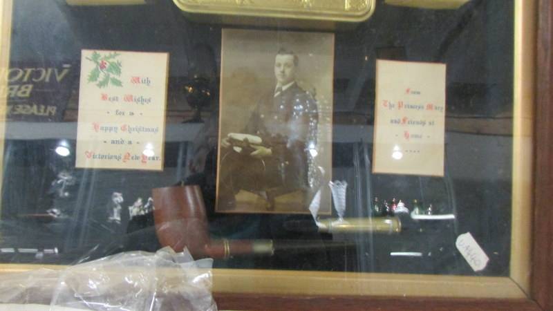 An oak framed and glazed collage H M S Albion with Christmas gifts to servicemen 1914 from H.M - Image 4 of 5