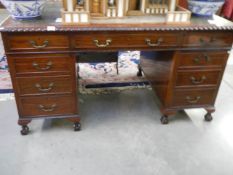 A mahogany double pedestal desk. Collect only.