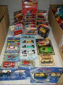 13 boxed Zymax Dyna wheels die cast model cars and a quantity of various manufacture vehicles.