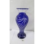 A 16" tall Bohemian cut glass vase.