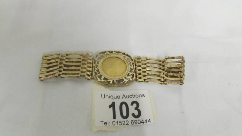 An 1874 Sovereign mounted in a bracelet, total weight 25.2 grams. no scratches, bracelet is