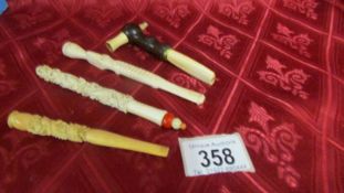 Three antique ivory cheroot holders and one other item. Available for UK shipping only.