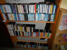 Three shelves of cassette tapes, mostly easy listening and classical.