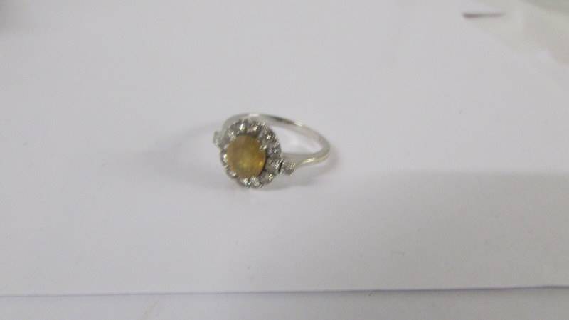 A Yellow sapphire and diamond cluster ring, approximately 3 carats with 14 round brilliant cut - Image 5 of 12