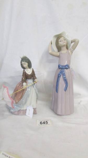 A Lladro figure of a girl with a parasol and another of a girl in hat. - Image 4 of 4