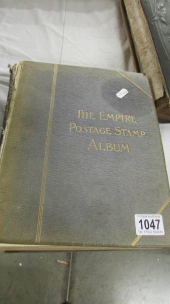 The Empire Stamp Album of stamps including four pages of penny reds.