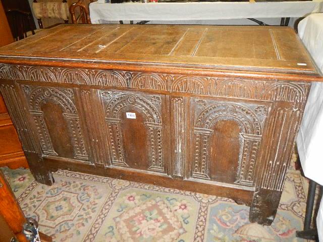 A period oak carved linen chest. Collect only.