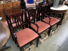A set of 6 dark wood stained dining chairs with pink velvet seat pads