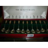 A cased set of ten hall marked silver 'Queen's Beasts' spoons. (weight 330gms)