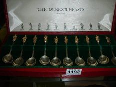 A cased set of ten hall marked silver 'Queen's Beasts' spoons. (weight 330gms)