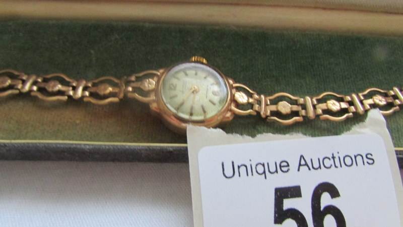 A 9ct gold Accurist ladies wrist watch. It winds and runs, Bracelet is hallmarked 9ct, Weight 11.5g - Image 2 of 2