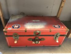 A red antique travel trunk. Collect only.