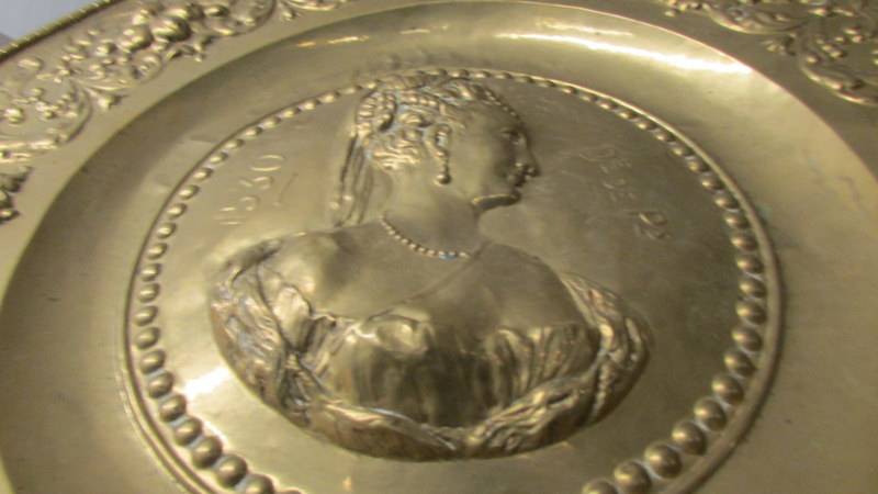 A large brass plaque depicting a female profile. - Image 2 of 2