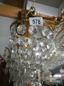 A small basket style glass chandelier. Collect only.