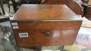 A burr walnut travel case made by Dalton of London. Not dated but probably Victorian era, this large