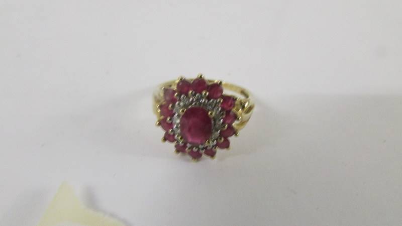 A yellow gold ruby and diamond ring, size P. - Image 7 of 8